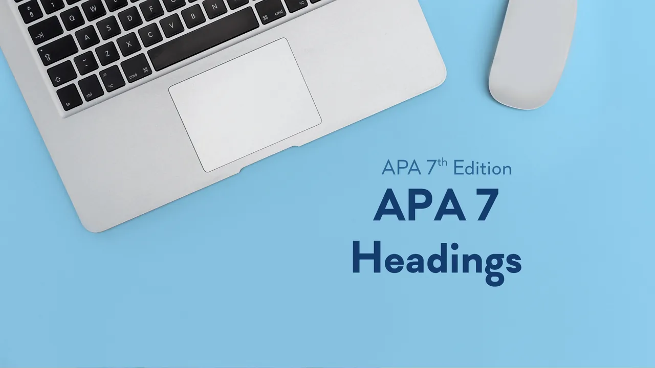 A laptop and a mouse seen from above on a sky-blue desk, beside the title APA 7 Headings, APA 7th Edition